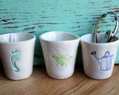 Organizing Cups with seahorse, bee or watering can