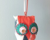 Small coral pink and aqua owl ornament
