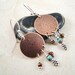 Medicine shield earrings. Etched copper discs. Sterling silver. Blue and red. Earthy colors. Mixed metals. Medicine wheel