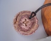 handmade ceramic rustic x pendant on leather cord