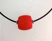 Red Bohemian Pressed Glass Bead on Goat Cord Choker.