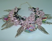 Braided Black Leather with Pink Crystals, Silver Feathers and Indian Heads