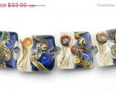 ON SALE 40% OFF Four Transparent Ink Blue w/Free Style Pillow Beads  -  Handmade Glass Lampwork Bead Sets - 10407014