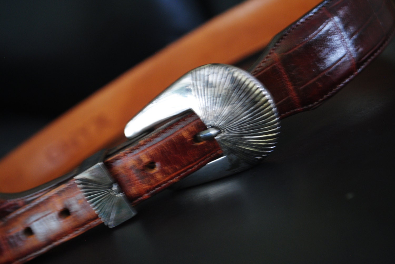 Luxurious vintage 70s  brown genuine croc style leather , unisex belt with silvertone metal buckle. Made by Onyx. Size  S-M