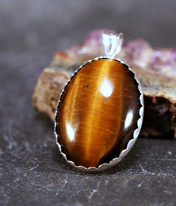 Tiger's Eye Pendant - 18 mm x 25 mm gold tigers eye set in sterling silver