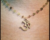 Wire Wrapped Green Garnet with Brass Golden Om