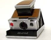 Vintage Polaroid SX-70 Land Camera with carrying case - brown folding camera