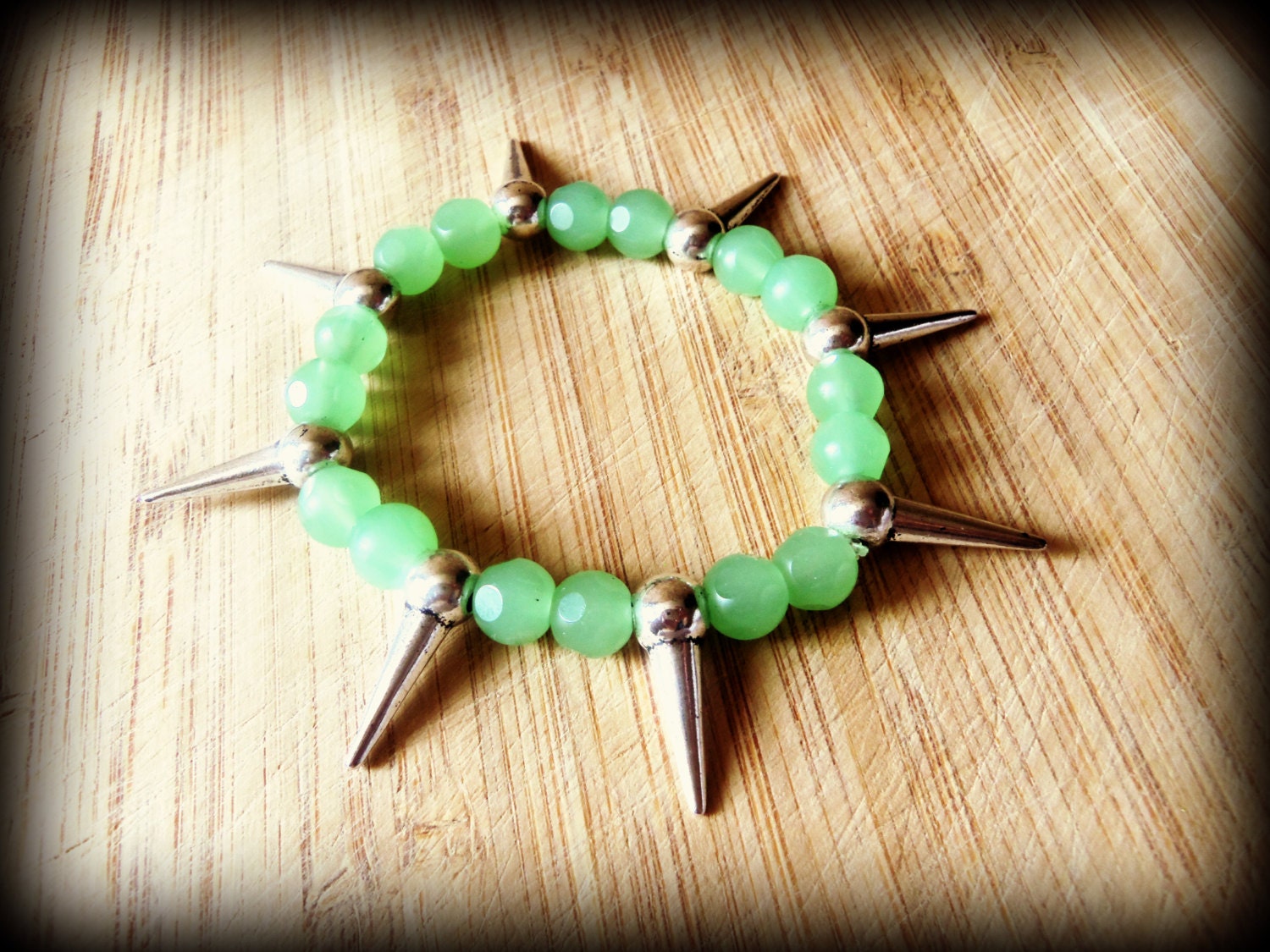 Tribal Silver Spikes and Green Peridot Glass Beads Bracelet