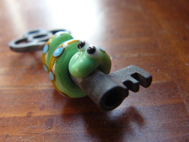 Vintage key with lampwork snake bead