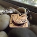 Lucky Us Copper Keychain with 3 lucky pennies     The squared version