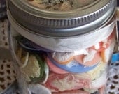 Kerr Glass Canning Jar full of Cameos and a charm or 2 A mix of sizes, some vintage ECS