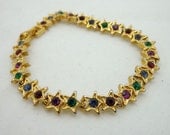 Vintage Signed USA Bracelet Rhinestone Gold Tone Chain Link Red Green Blue Purple Multi Colored Prom