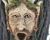 Sold.   Satyr Birdhouse.
