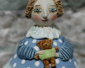 Girl with a teddy bear.