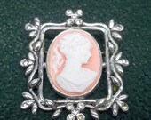 Vintage peachy cream cameo brooch silver tone frame