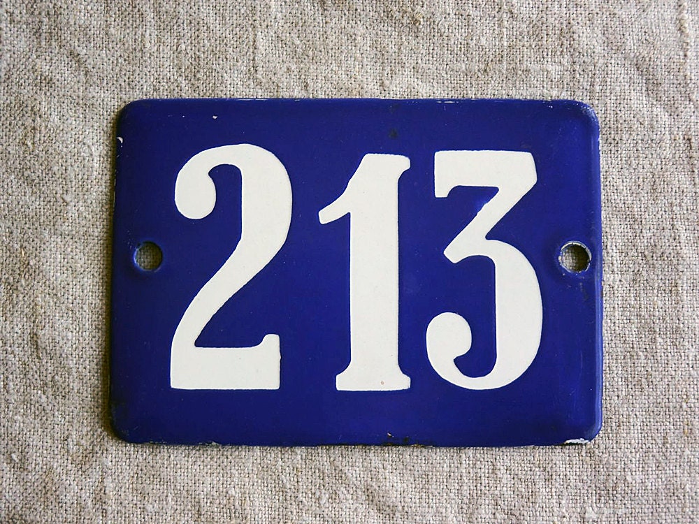 vintage house number, enamel sign white number 213 on blue, from the Netherlands