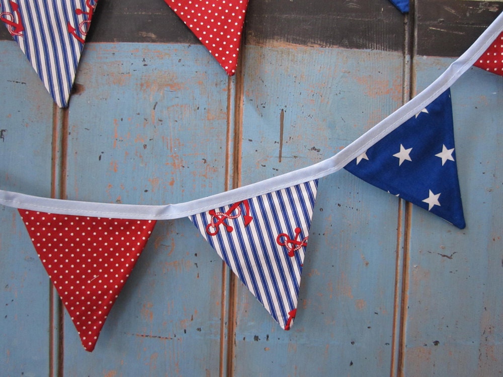 Small Classic Children's Bunting. Fabric Patterns - Stars, stripes anchors and  Spots. Colours -  Red, Royal Blue and White.