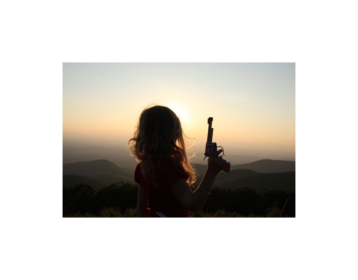 Rockabilly photograph Little Cowgirl with Pistol color print in the mountains at sunset Country Western, Indie Art