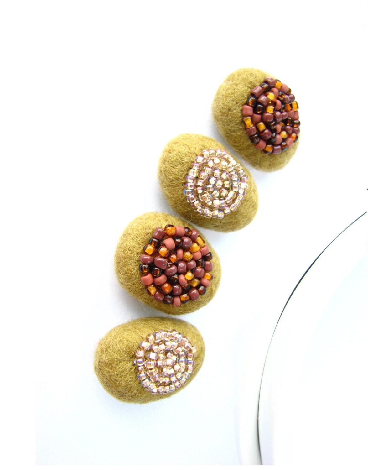 Set of 4 goldenrod felted round wool pebbles /  beads decorated with seed beads