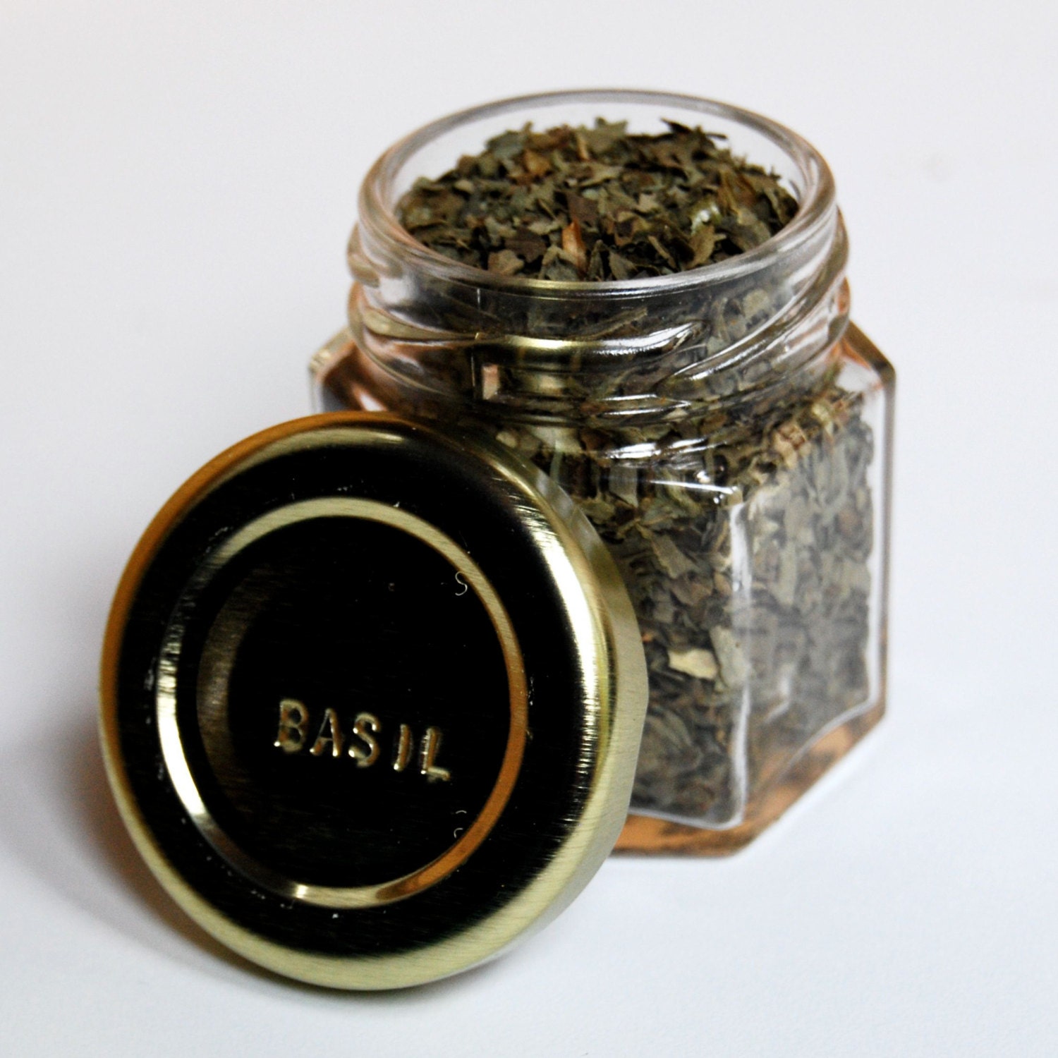 Glass Spice Jars. Customize this Magnetic Spice Rack (set of 24 empty STAMPED jars with your choice of spice names).  Free Shipping.