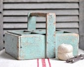 rustic wooden box with green paint