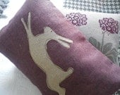 hand printed muted mulberry leaping  hare cushion cover