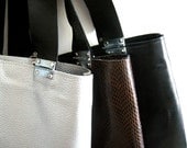 Brown (snake pattern) leather bag , tote with black strips and hinges