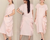Floral pleated tea dress...100 percent cotton in peach color.