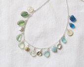 Beachcomber necklace with antique seaglass, handmade silver pebble and button, vintage buttons and shell