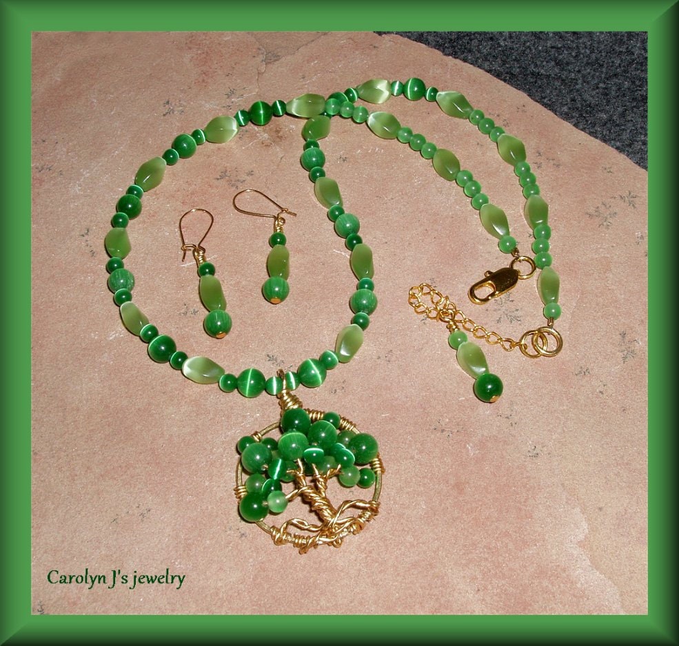Green Cats Eye Wire Wrapped Tree of Life pendant on Green Fiber Optic necklace