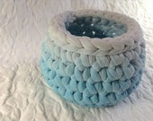 Light blue and white crocheted basket created from recycled t shirts