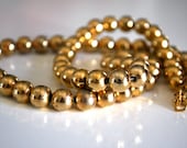 Vintage Strand Of Gold Metal Beads