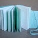 Blue suede book with letterpress printed pages