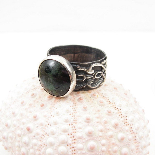 Sterling silver metalwork ring with zoisite with ruby , ornament band