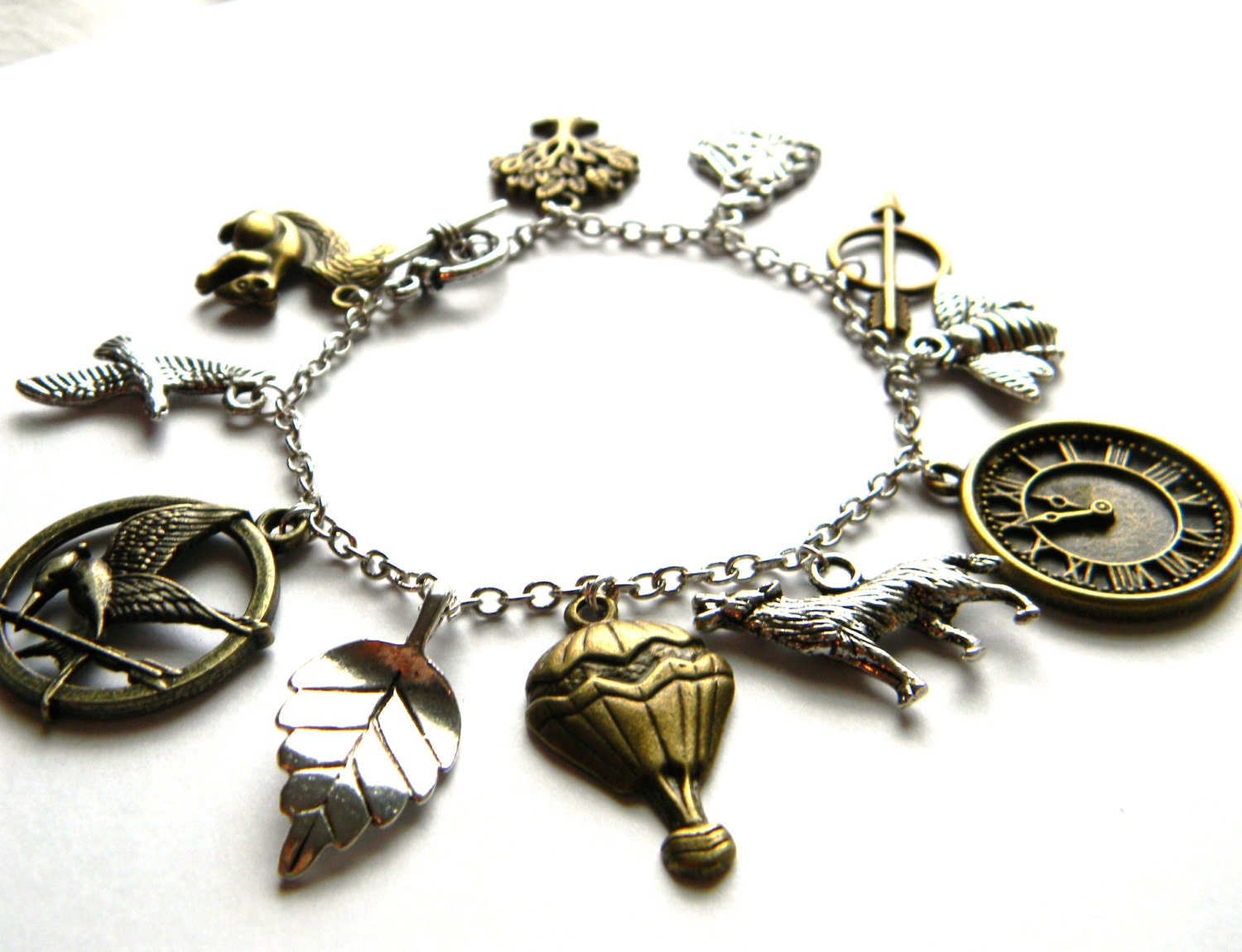 Hunger Games Charm Bracelet - Katniss, Mockingjay, Bow and Arrow - Geekery - Gifts Under 25, 50, 100