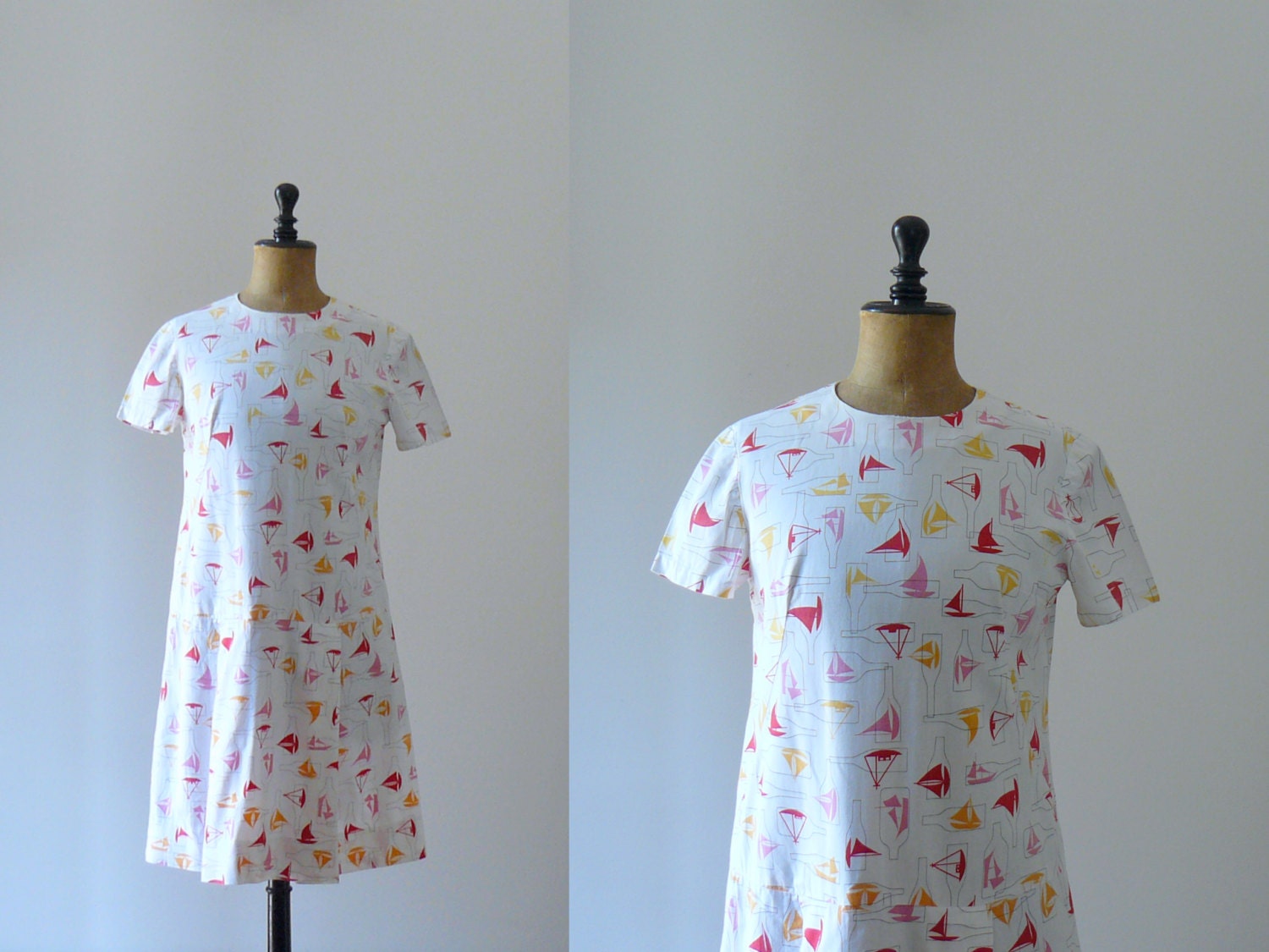 Vintage 1960s Mod novelty print dress. Red boat in a bottle nautical print white dress
