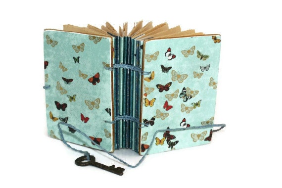 Pocket Journal with small Butterflies and Skeleton Key Closure