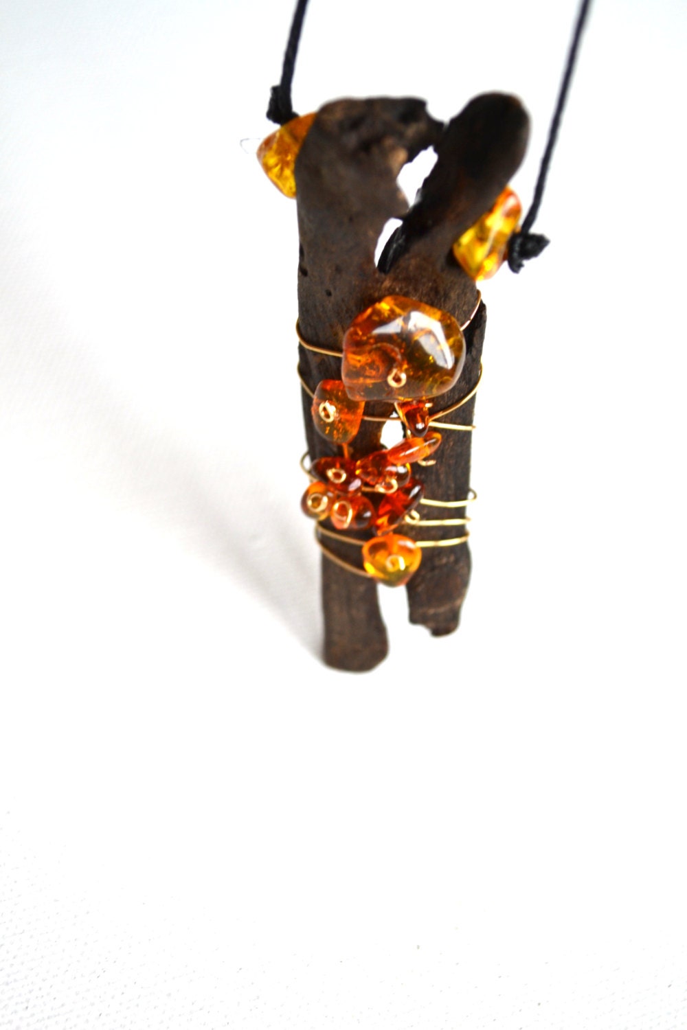 Handmade unique necklace from driftwood and natural Baltic Sea amber