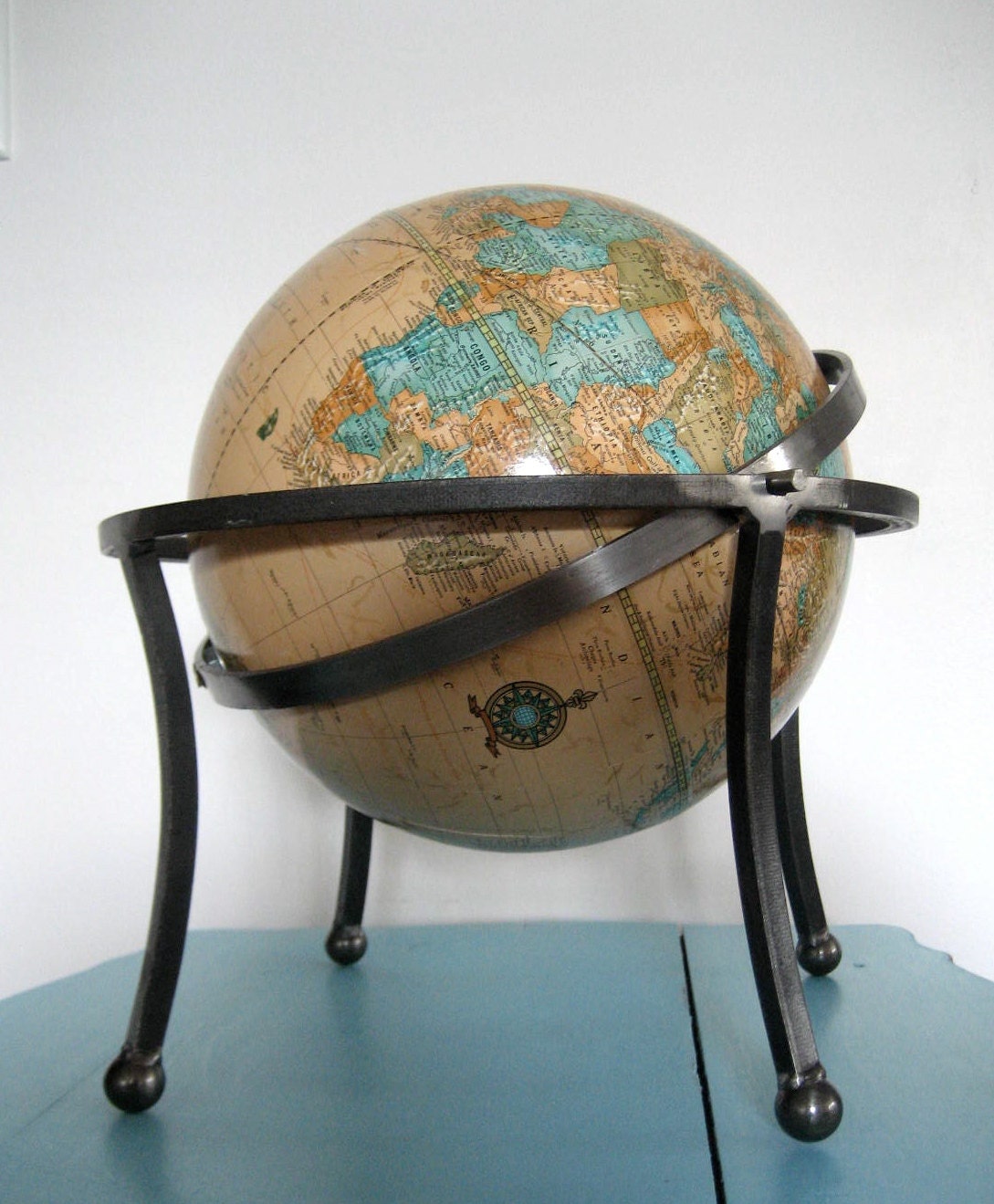 vintage Cram's Imperial World Globe in heavy wrought iron base