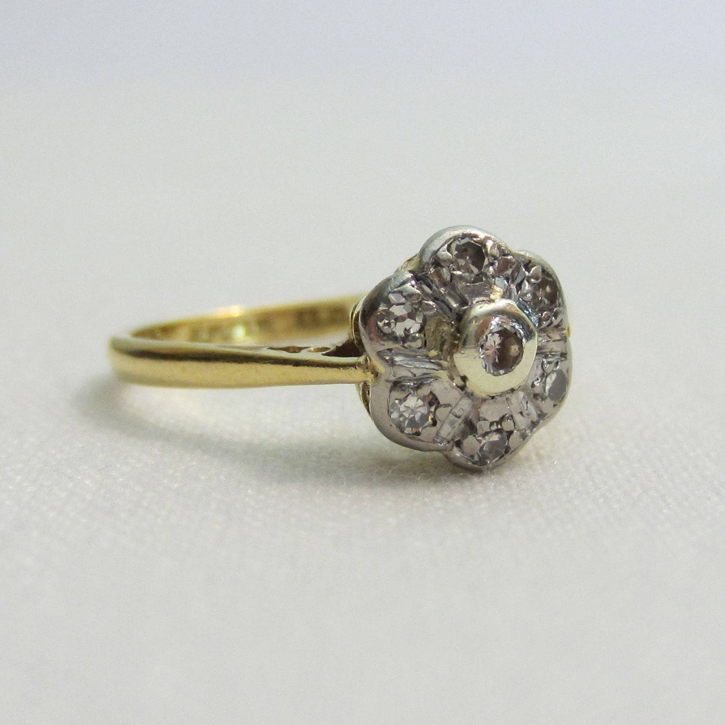 Vintage Daisy Diamond Ring. Halo Diamond Engagement Ring in Platinum & Yellow Gold.