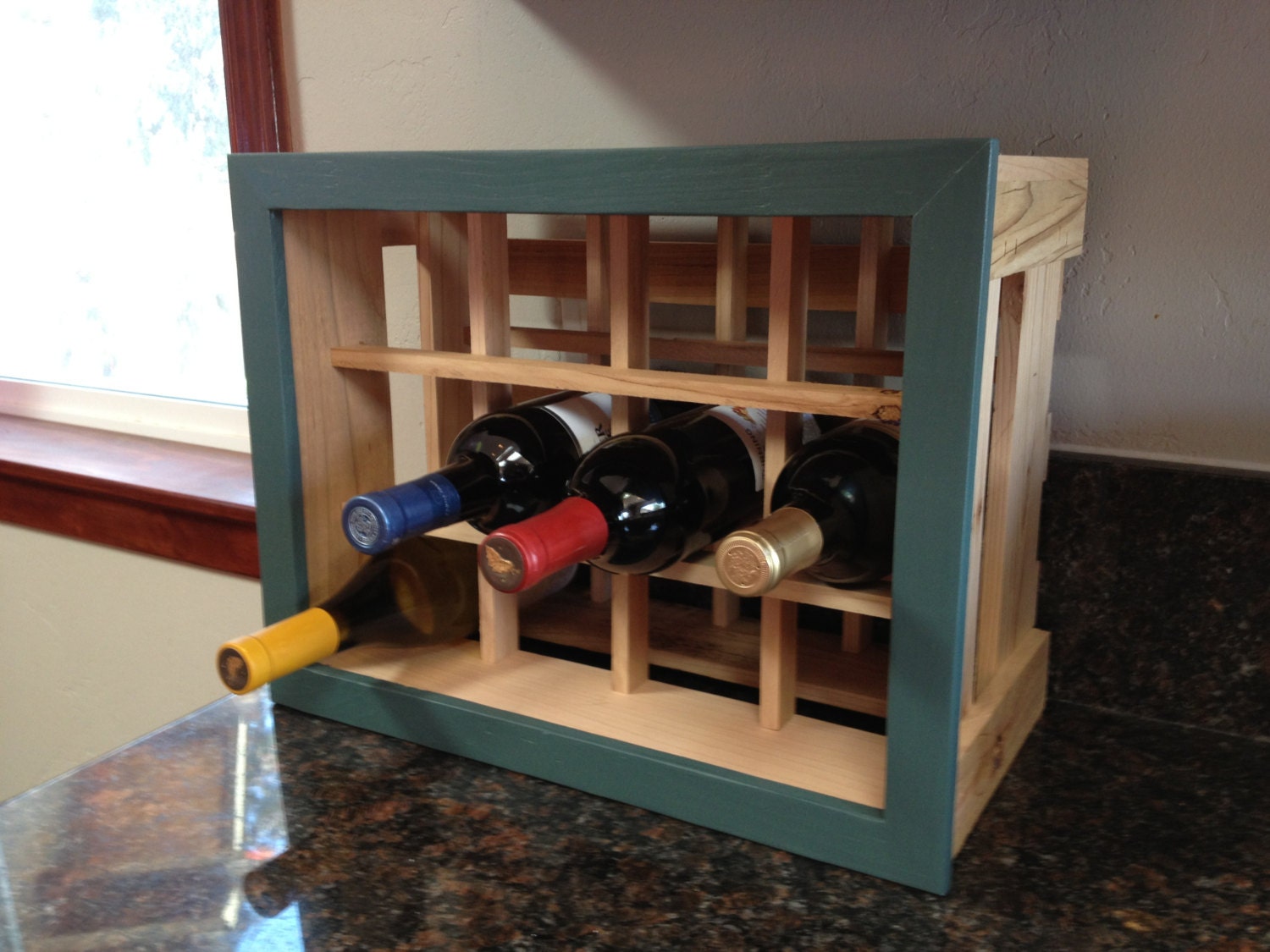 Handmade Wine Rack holds 12 bottles made with recycled cedar.