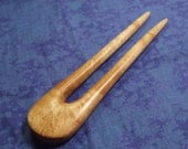 Hand carved small hair fork in birdseye maple