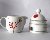 Vintage decorated sugar bowl and milk jar