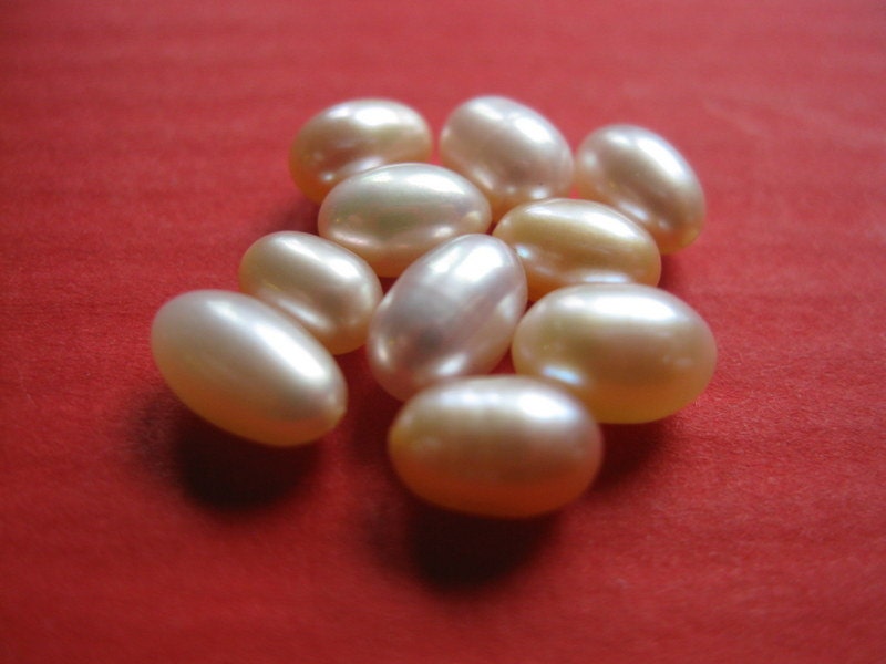 10 loose freshwater PEACH PEARLS half drilled