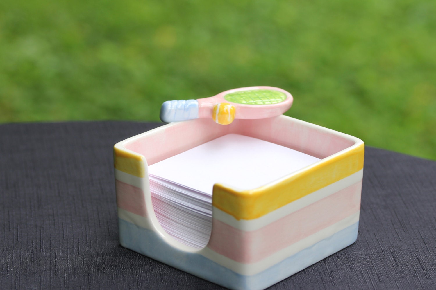Tennis note holder