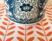Dotty Leaves - hand screen printed fabric in Tangerine Dream