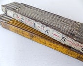 Yellow and White Wooden Folding Measuring Tape Stick