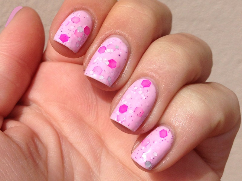 Nail polish - "Sweet As" neon pink, silver and white glitter in a light pink base