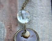 Teachers - Let your life speak - mixed metal - hangs from large pale aqua drop, floats in a decorative antique gold ring, with bronze apple
