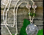 Celtic Triskele Necklace- with green crystals